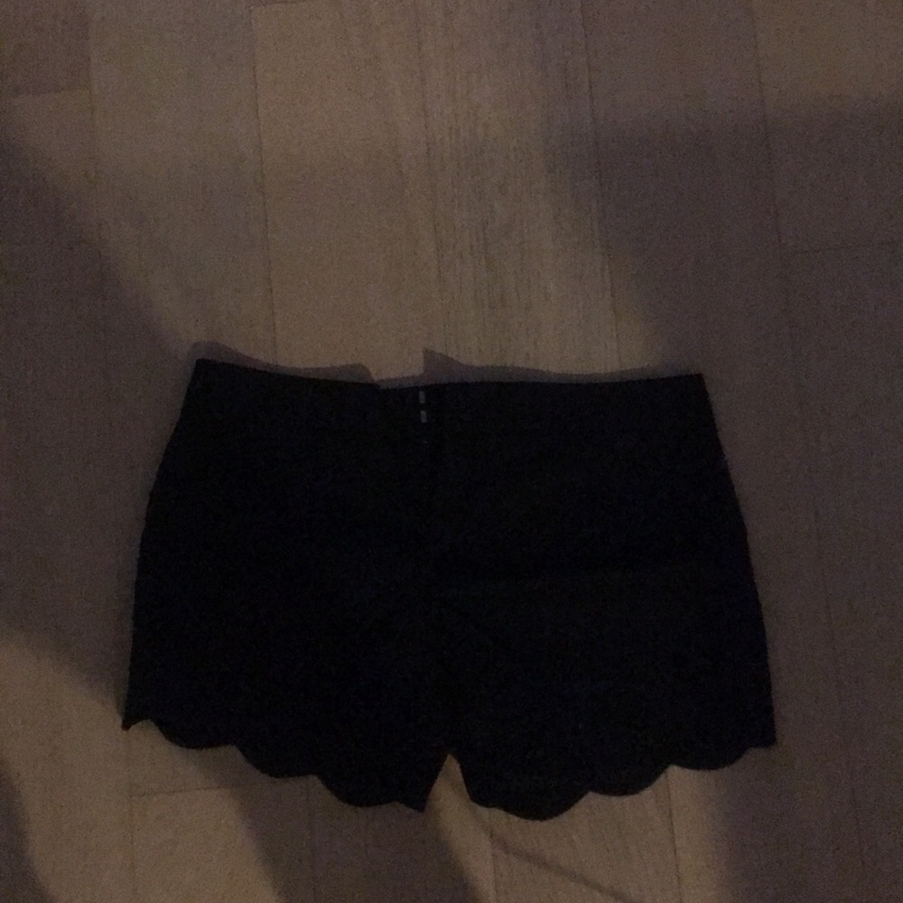 Black scalloped shorts